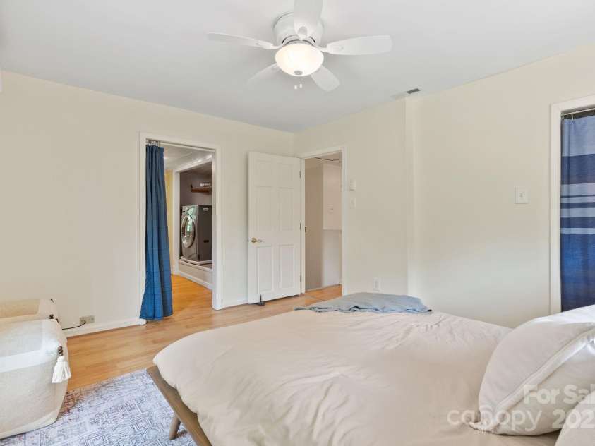 20 Pickens Lane, Weaverville, NC 28787.  MLS# CAR4267121, YatesRealty ID 24647. Upstairs Primary bedroom facing closet & laundry area
