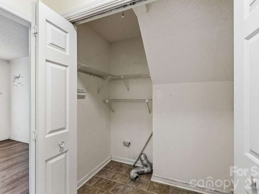 6719 Raeburn Lane, Charlotte, NC 28227.  MLS# CAR4377347, YatesRealty ID 24654. Laundry Closet Main Floor