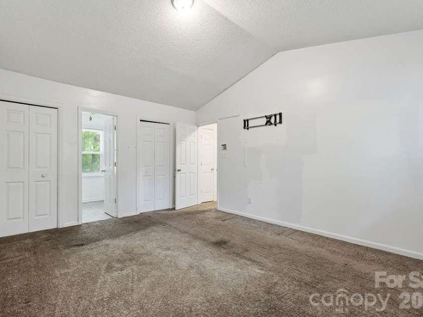 6719 Raeburn Lane, Charlotte, NC 28227.  MLS# CAR4377347, YatesRealty ID 24654. Primary Bedroom