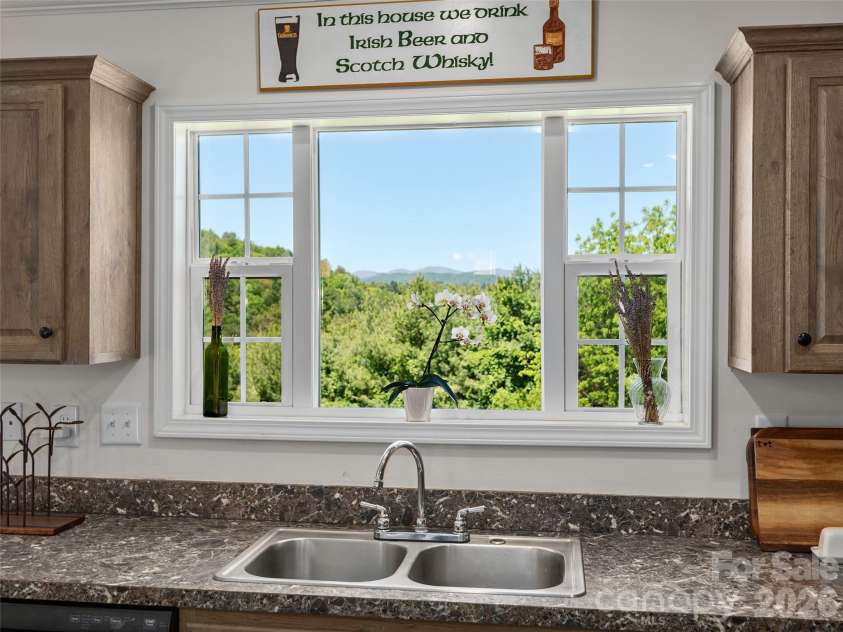 271 Sluder Branch Road, Leicester, NC 28748.  MLS# CAR4384358, YatesRealty ID 24655. 