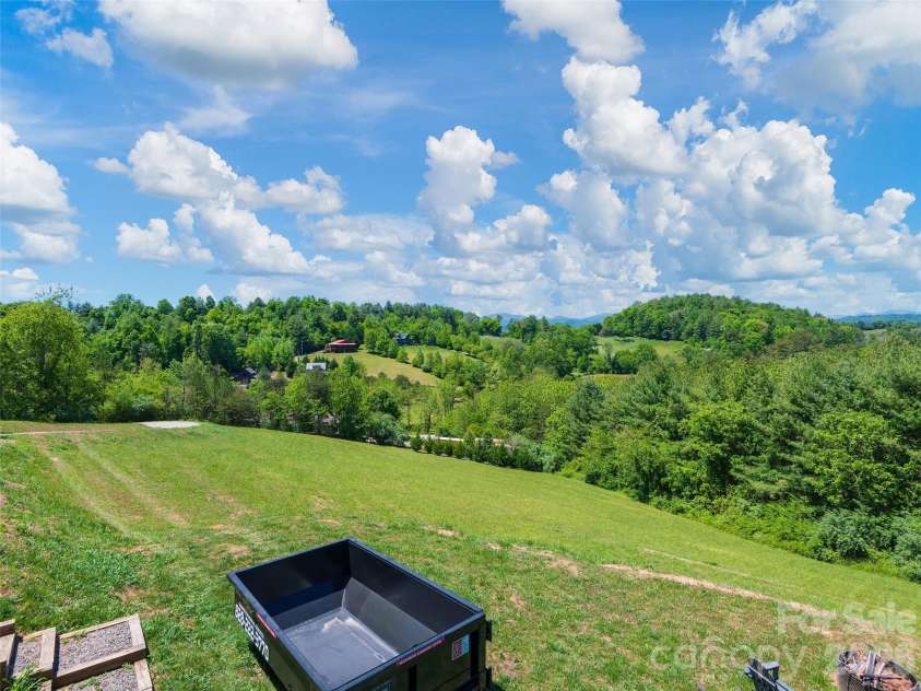271 Sluder Branch Road, Leicester, NC 28748.  MLS# CAR4384358, YatesRealty ID 24655. 