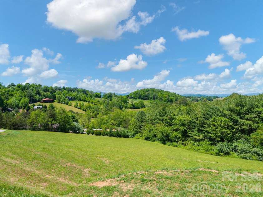 271 Sluder Branch Road, Leicester, NC 28748.  MLS# CAR4384358, YatesRealty ID 24655. 