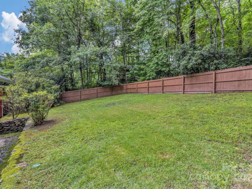 60 Meeks Road, Black Mountain, NC 28711.  MLS# CAR4269657, YatesRealty ID 24655. Backyard