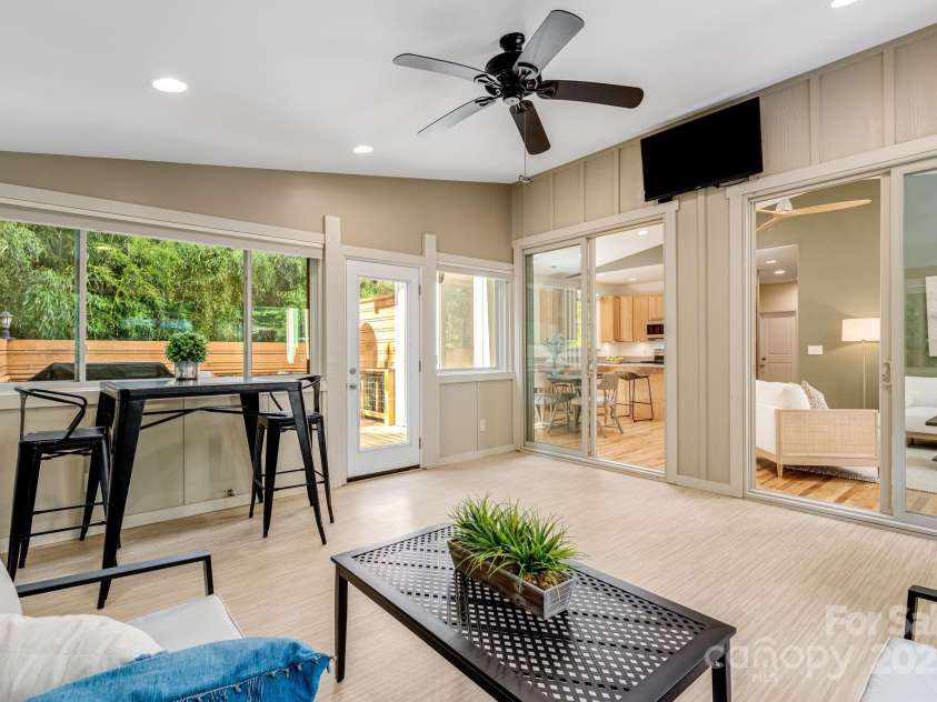 506 Hiawassee Avenue, Black Mountain, NC 28711.  MLS# CAR4265493, YatesRealty ID 24657. Enclosed sunroom retreat