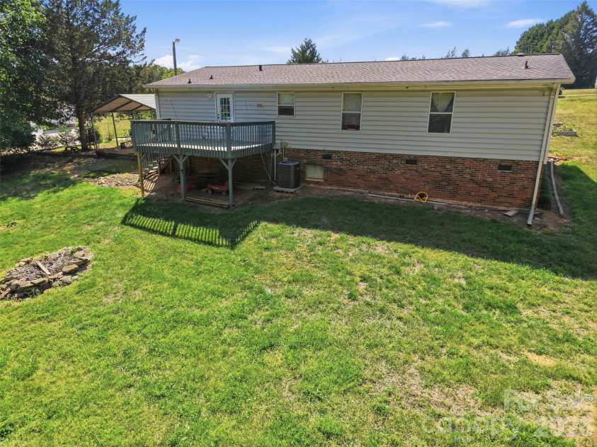333 Howard Norton Drive, Hiddenite, NC 28636.  MLS# CAR4382521, YatesRealty ID 24658. Back of home