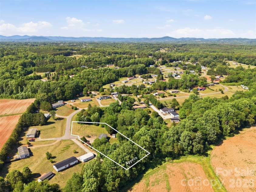 333 Howard Norton Drive, Hiddenite, NC 28636.  MLS# CAR4382521, YatesRealty ID 24658. Lot lines are approximate