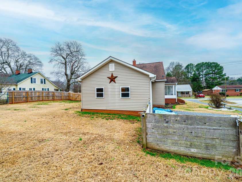 235 Spring Street, Mocksville, NC 27028.  MLS# CAR4336603, YatesRealty ID 2466. Camera on fence will not convey