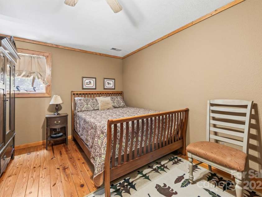 747 Bear Cove Circle, Bryson City, NC 28713.  MLS# CAR4278291, YatesRealty ID 24661. 2nd floor bedroom 1