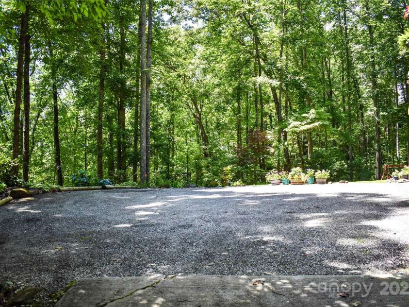 747 Bear Cove Circle, Bryson City, NC 28713.  MLS# CAR4278291, YatesRealty ID 24661. Parking pad
