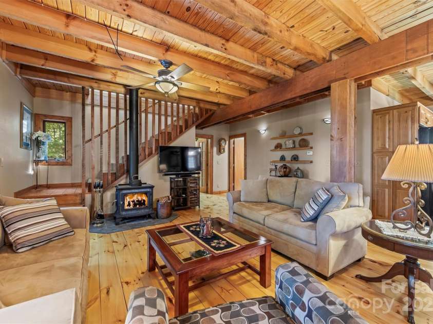 747 Bear Cove Circle, Bryson City, NC 28713.  MLS# CAR4278291, YatesRealty ID 24661. Wood Stove in Living Room