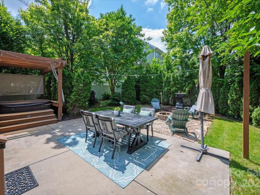 189 Mills Lane, Fort Mill, SC 29708.  MLS# CAR4259417, YatesRealty ID 24667. Enjoy the hot tub with covered pergola
