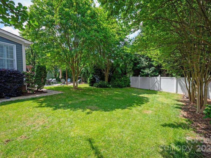 189 Mills Lane, Fort Mill, SC 29708.  MLS# CAR4259417, YatesRealty ID 24667. Fenced yard with private entrance to the community trail system