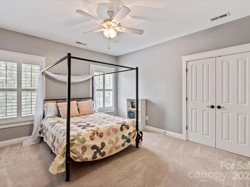 189 Mills Lane, Fort Mill, SC 29708.  MLS# CAR4259417, YatesRealty ID 24667. One of four secondary bedrooms