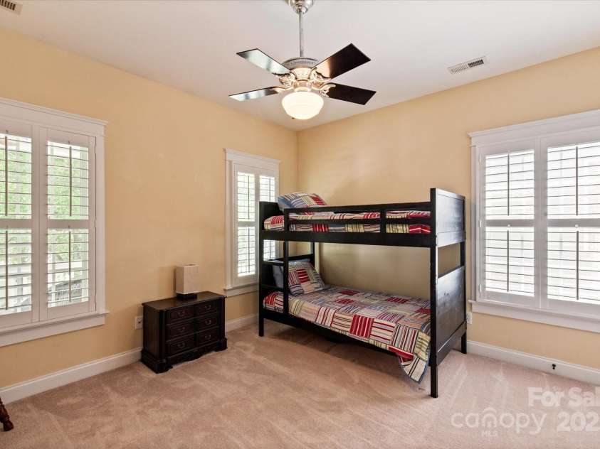 189 Mills Lane, Fort Mill, SC 29708.  MLS# CAR4259417, YatesRealty ID 24667. One of four secondary bedrooms