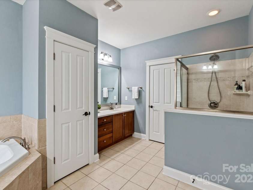 189 Mills Lane, Fort Mill, SC 29708.  MLS# CAR4259417, YatesRealty ID 24667. Owner's bathroom with separate vanities