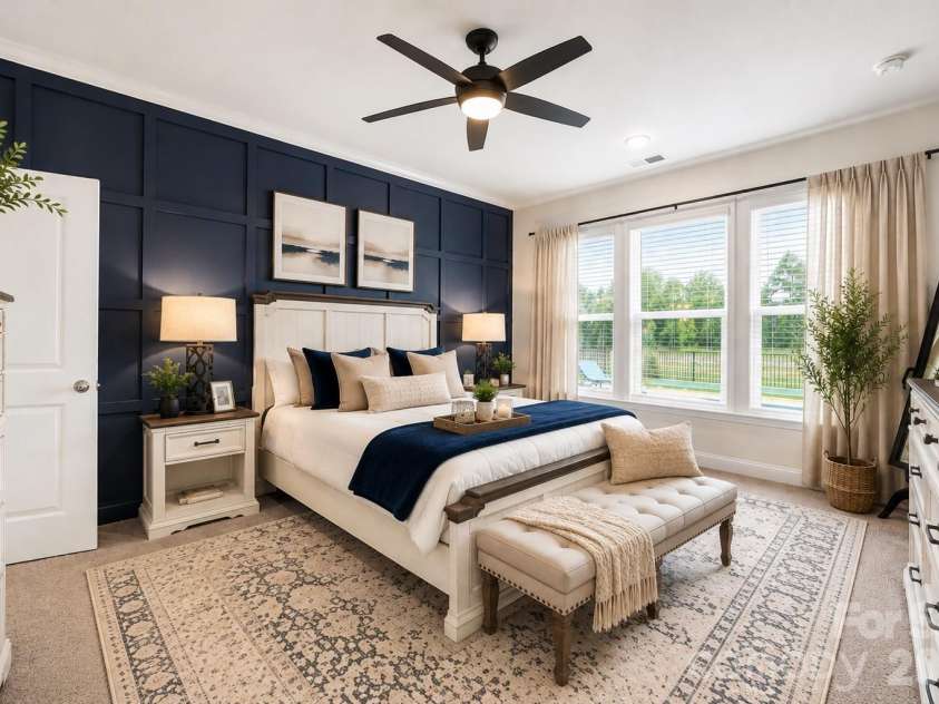 3129 Gavin Lane, Harrisburg, NC 28075.  MLS# CAR4384638, YatesRealty ID 24668. Virtually Staged Bedroom with added decor and ceiling fan