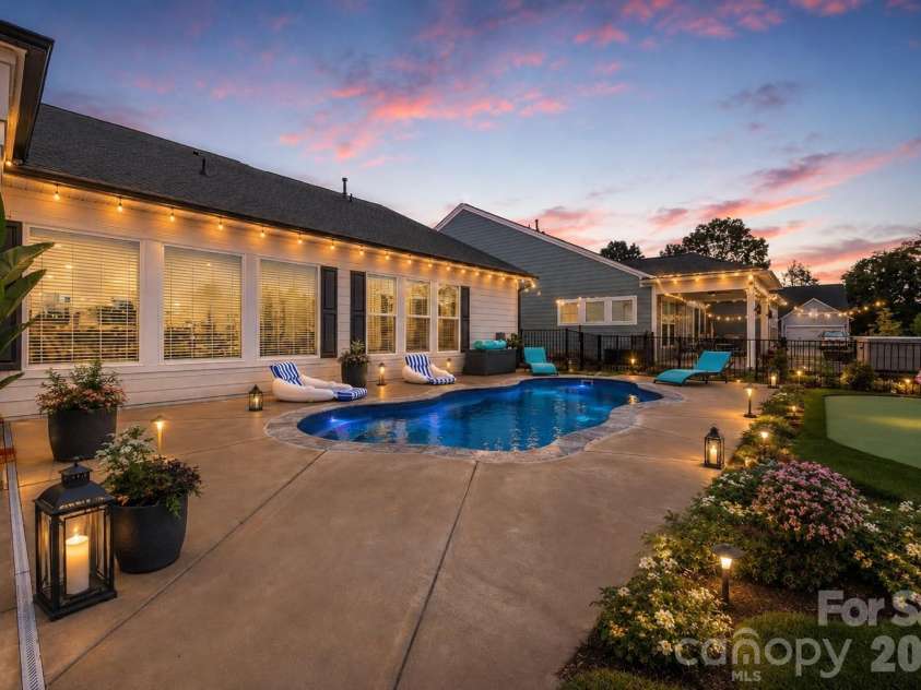 3129 Gavin Lane, Harrisburg, NC 28075.  MLS# CAR4384638, YatesRealty ID 24668. Virtually Staged to show Twilight possible Landscaping