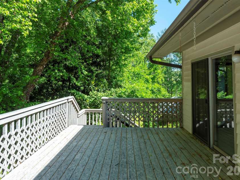29 Hillcreek Drive, Asheville, NC 28804.  MLS# CAR4383338, YatesRealty ID 24672. Deck and Primary Sliding Doors