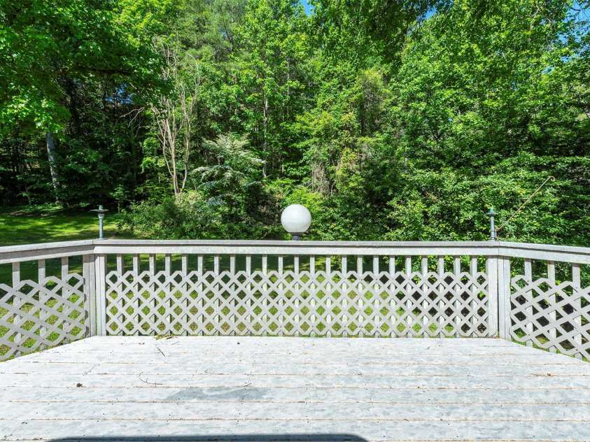 29 Hillcreek Drive, Asheville, NC 28804.  MLS# CAR4383338, YatesRealty ID 24672. Expansive Back Deck w Private Backyard