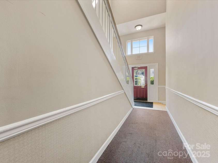 10650 Hill Point Court, Charlotte, NC 28262.  MLS# CAR4277696, YatesRealty ID 24676. Entry foyer into building