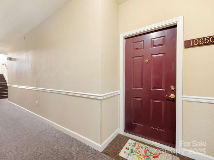 10650 Hill Point Court, Charlotte, NC 28262.  MLS# CAR4277696, YatesRealty ID 24676. Front door entrance