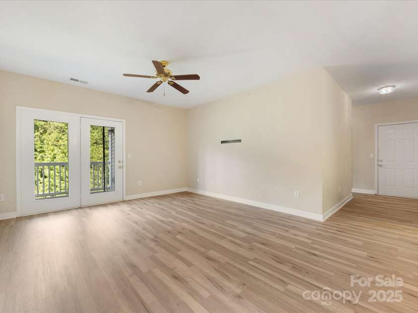 10650 Hill Point Court, Charlotte, NC 28262.  MLS# CAR4277696, YatesRealty ID 24676. Living room
