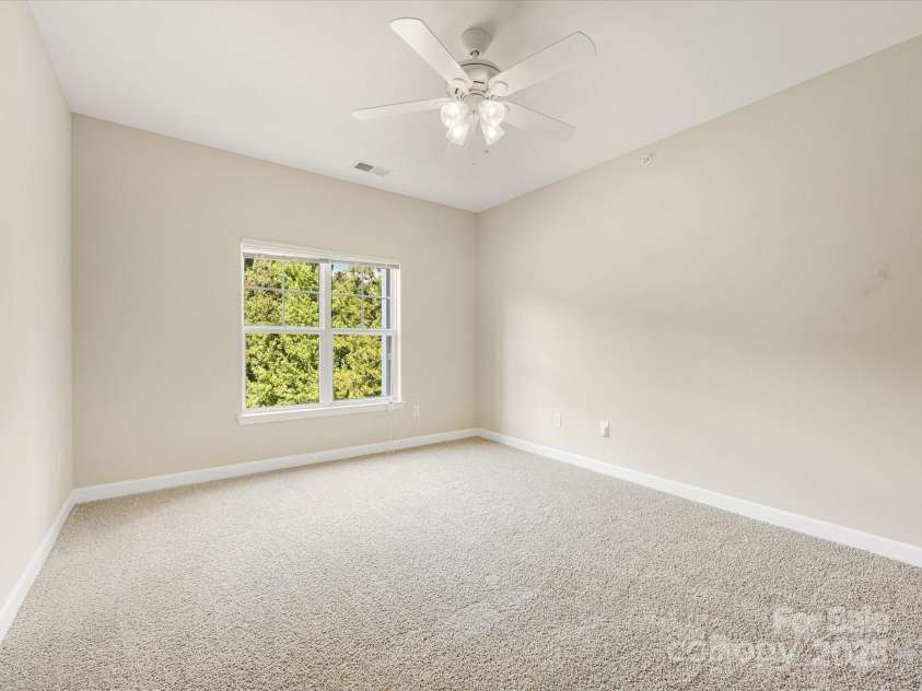 10650 Hill Point Court, Charlotte, NC 28262.  MLS# CAR4277696, YatesRealty ID 24676. Primary bedroom