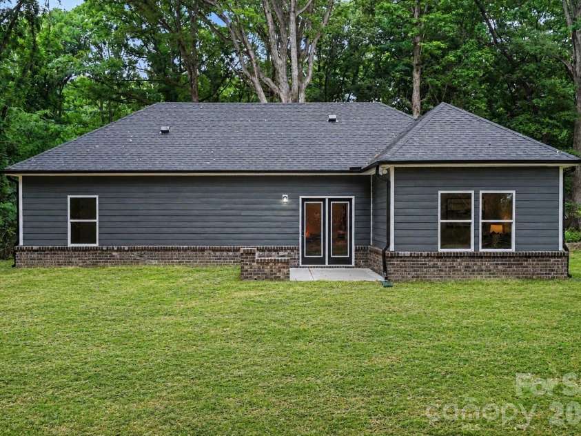 1002 Kingswood Drive, Monroe, NC 28112.  MLS# CAR4385415, YatesRealty ID 24679. Digitally Enhanced Back Yard