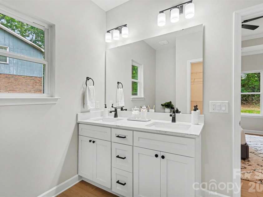 1002 Kingswood Drive, Monroe, NC 28112.  MLS# CAR4385415, YatesRealty ID 24679. Spa Like Primary Bathroom