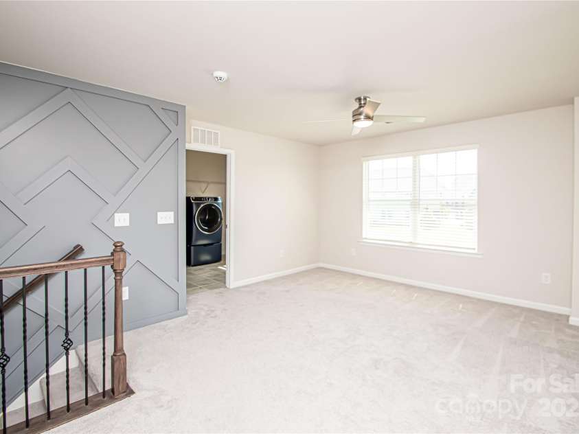 17718 Terryglass Lane, Charlotte, NC 28278.  MLS# CAR4274833, YatesRealty ID 24679. Beautiful wood design on wall
