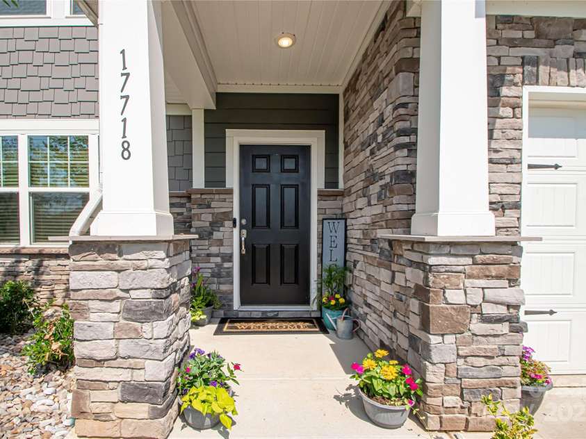 17718 Terryglass Lane, Charlotte, NC 28278.  MLS# CAR4274833, YatesRealty ID 24679. Front of the house has beautiful stone work.
