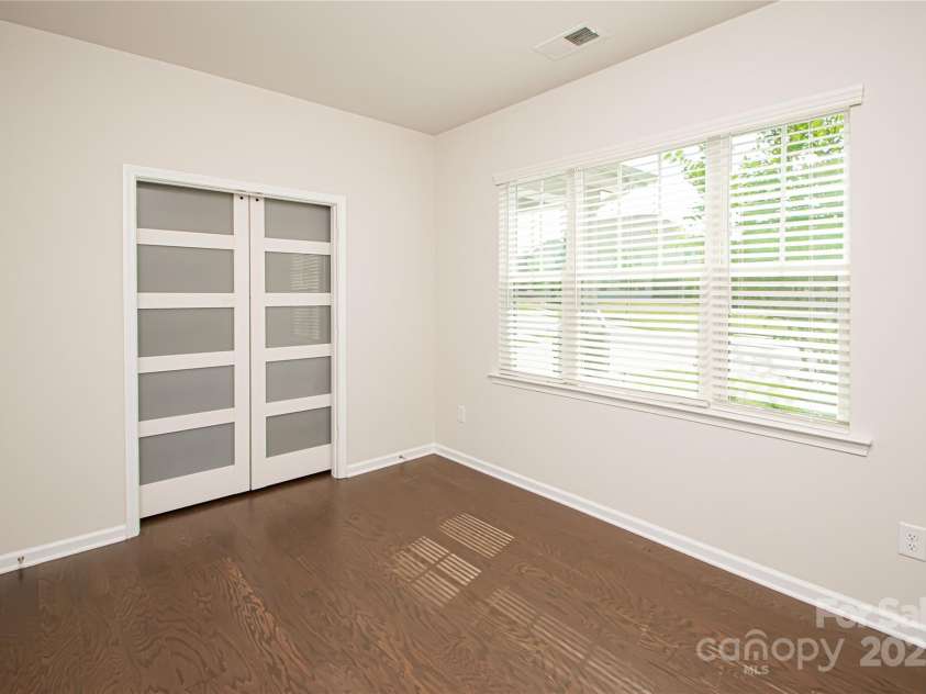 17718 Terryglass Lane, Charlotte, NC 28278.  MLS# CAR4274833, YatesRealty ID 24679. Office has beautiful new barn doors, large windows and LVP flooring