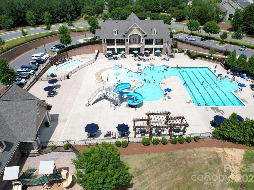 17718 Terryglass Lane, Charlotte, NC 28278.  MLS# CAR4274833, YatesRealty ID 24679. Resort style pool with slide, lap pool and kiddy pool.  Beautiful club house with work out room.  These amenities are included with your HOA dues.
