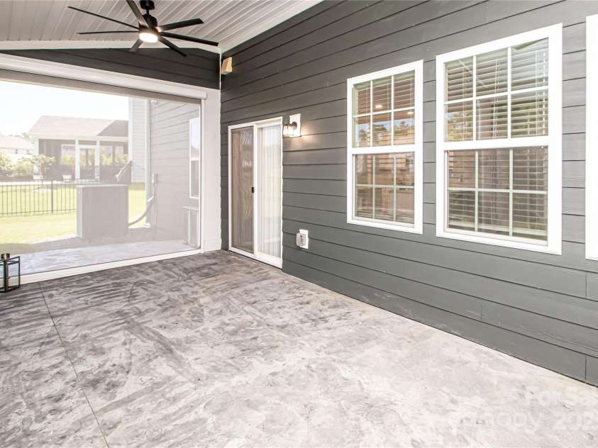 17718 Terryglass Lane, Charlotte, NC 28278.  MLS# CAR4274833, YatesRealty ID 24679. Screened in back porch with automatic retractable awning