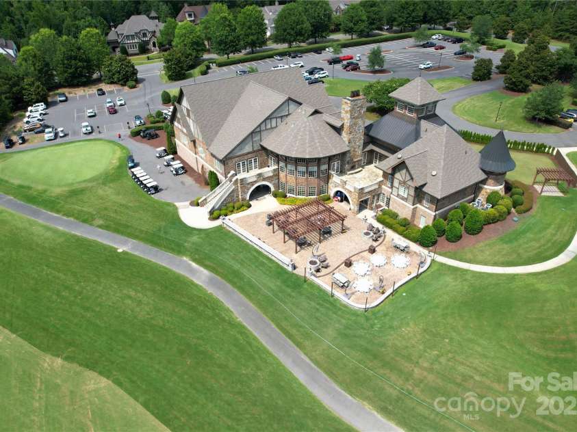 17718 Terryglass Lane, Charlotte, NC 28278.  MLS# CAR4274833, YatesRealty ID 24679. Stunning view of the golf club house!  Must see!  Additional membership required.