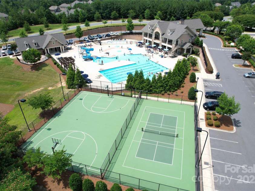 17718 Terryglass Lane, Charlotte, NC 28278.  MLS# CAR4274833, YatesRealty ID 24679. This pool, basketball and pickleball court are included with your HOA dues.
