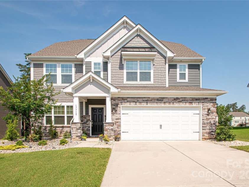 17718 Terryglass Lane, Charlotte, NC 28278.  MLS# CAR4274833, YatesRealty ID 24679. Welcome to 17718 Terryglass Lane located in the beautiful and highly desirable neighborhood of The Palisades.  Stones and additional bushes were added to the front enhancing the landscaping.