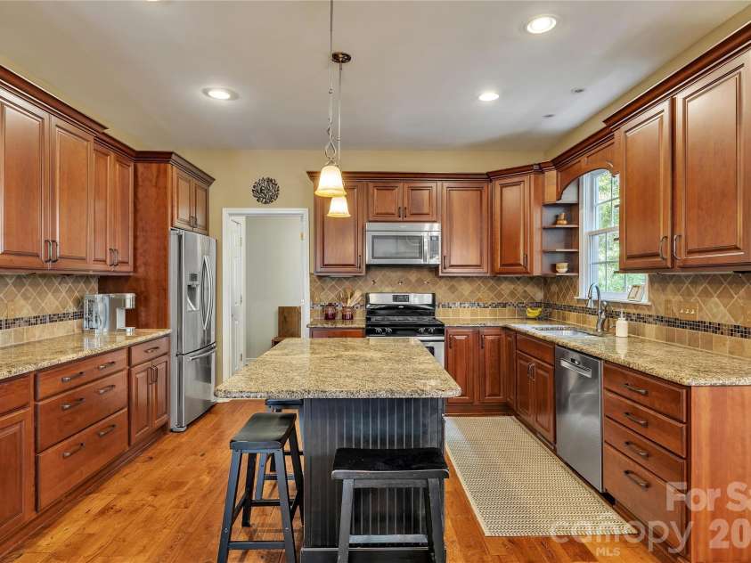 5709 Woodridge Court, Concord, NC 28027.  MLS# CAR4379806, YatesRealty ID 24685. 