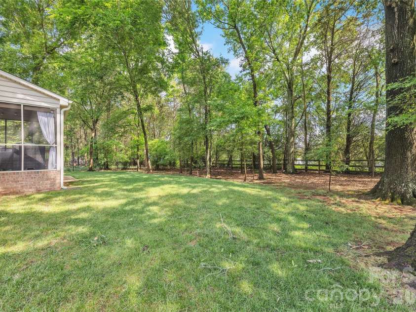 5709 Woodridge Court, Concord, NC 28027.  MLS# CAR4379806, YatesRealty ID 24685. 