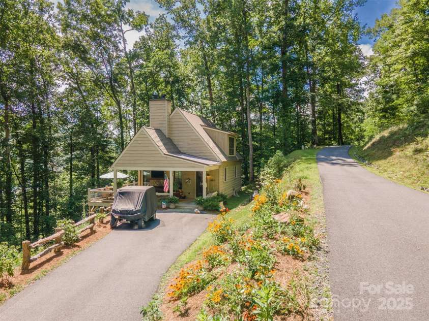 218 Pepperbush Lane, Tuckasegee, NC 28783.  MLS# CAR4250538, YatesRealty ID 24687. 