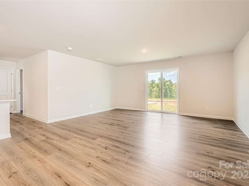 129 Astor Street, Troutman, NC 28166.  MLS# CAR4279370, YatesRealty ID 24688. Family Room