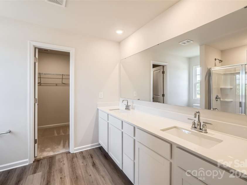 129 Astor Street, Troutman, NC 28166.  MLS# CAR4279370, YatesRealty ID 24688. Owner's Bath