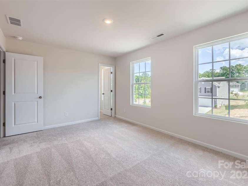 129 Astor Street, Troutman, NC 28166.  MLS# CAR4279370, YatesRealty ID 24688. Secondary Bedroom