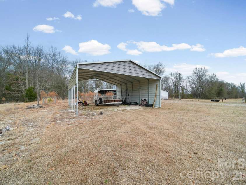 1004 Four Mile Loop, Cheraw, SC 29520.  MLS# CAR4332573, YatesRealty ID 2469. Carport