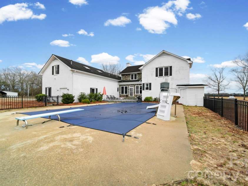 1004 Four Mile Loop, Cheraw, SC 29520.  MLS# CAR4332573, YatesRealty ID 2469. Pool with Slide and Diving Board