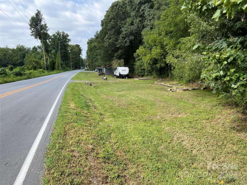 1961 Cane Creek Road, Fletcher, NC 28732.  MLS# CAR4233282, YatesRealty ID 247. 575 feet of road frontage.