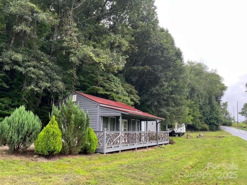 1961 Cane Creek Road, Fletcher, NC 28732.  MLS# CAR4233282, YatesRealty ID 247. Busy corner location on Cane Creek and Gap Creek Roads.