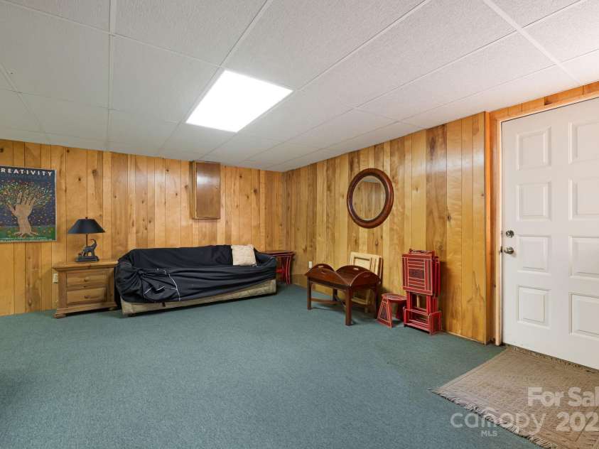 25 Westridge Court, Hendersonville, NC 28791.  MLS# CAR4279623, YatesRealty ID 24700. Basement Bedroom