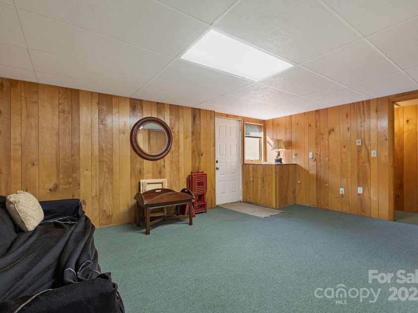 25 Westridge Court, Hendersonville, NC 28791.  MLS# CAR4279623, YatesRealty ID 24700. Basement Bedroom
