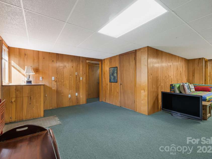 25 Westridge Court, Hendersonville, NC 28791.  MLS# CAR4279623, YatesRealty ID 24700. Basement Bedroom